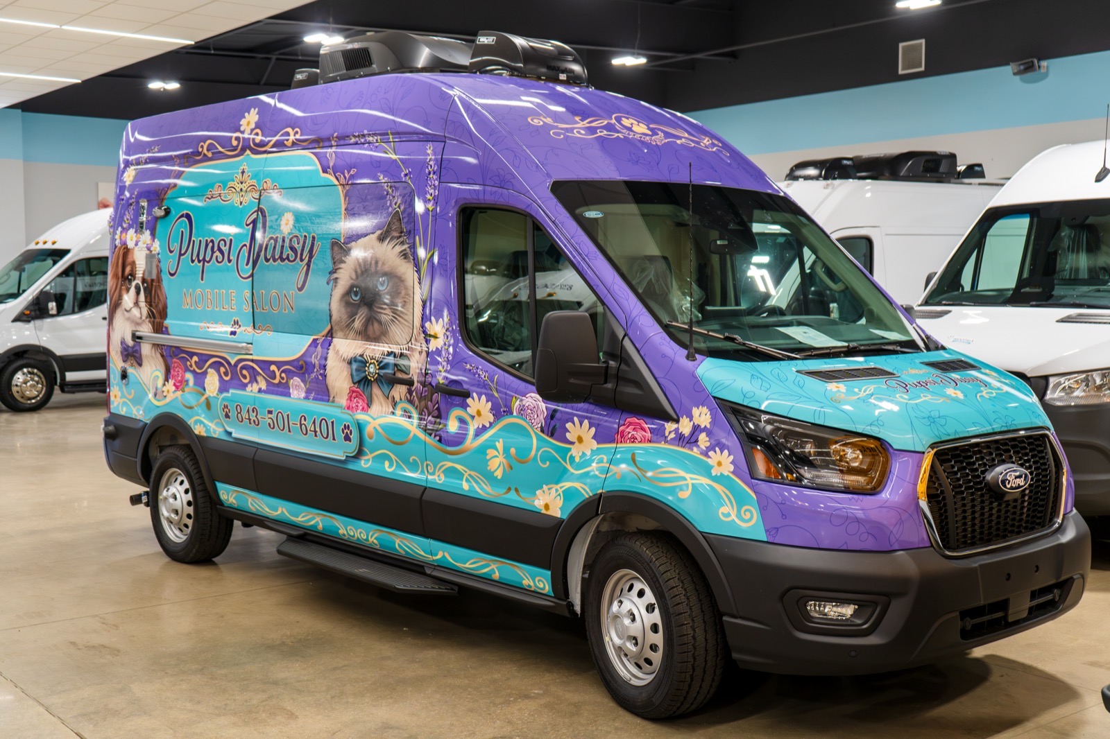 Pupsi Daisy Mobile Salon Wag'n Tails van in purple and teal wrap, ready for the road ahead