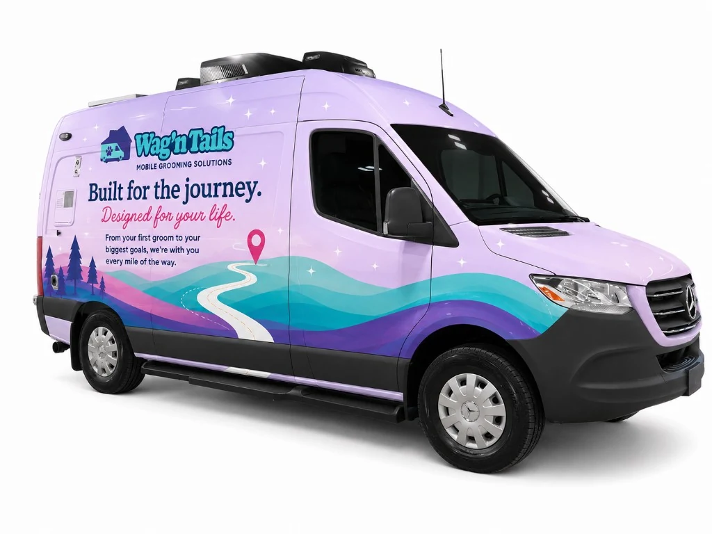 Quantum Groom Van™ exterior with Wag'n Tails Built for the journey wrap