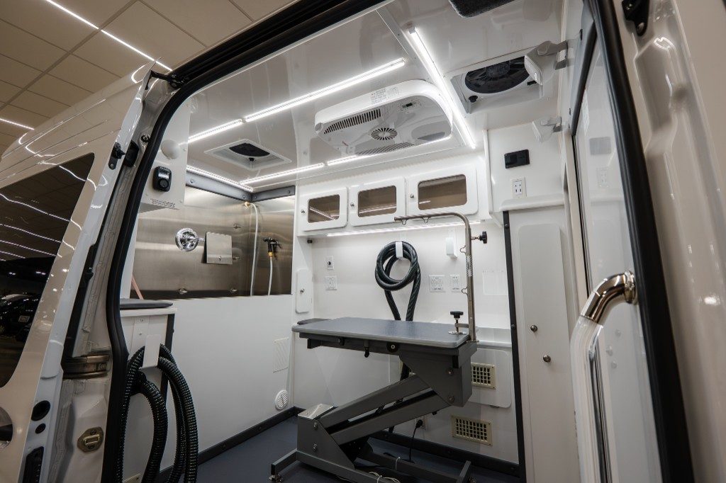 Quantum workspace looking toward the stainless bathing tub past the grooming table