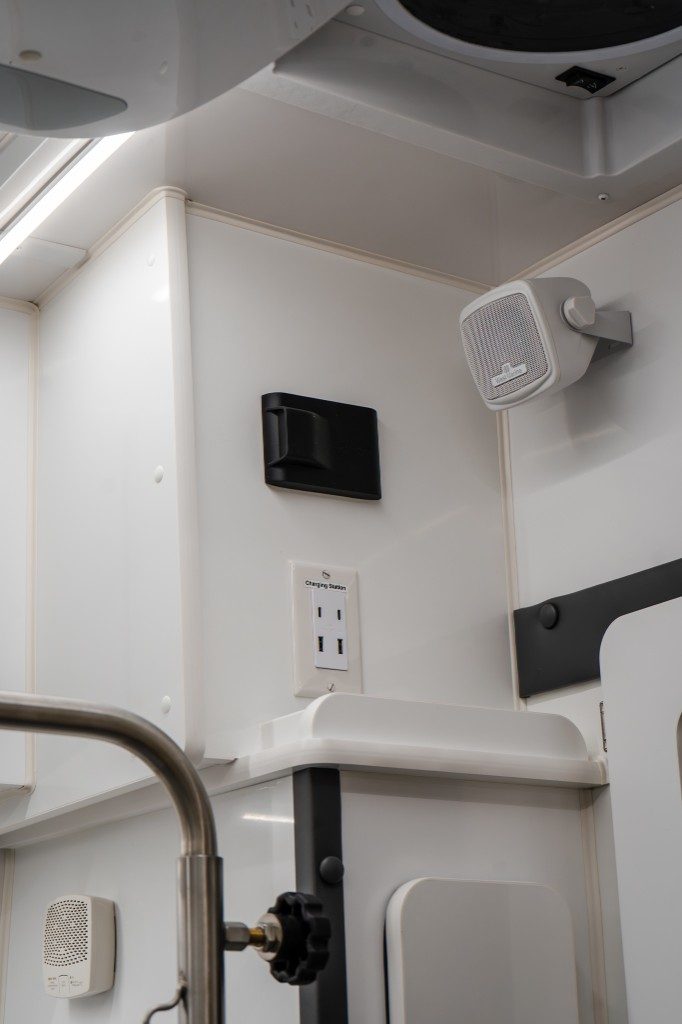 USB and AC outlets with cabin speakers