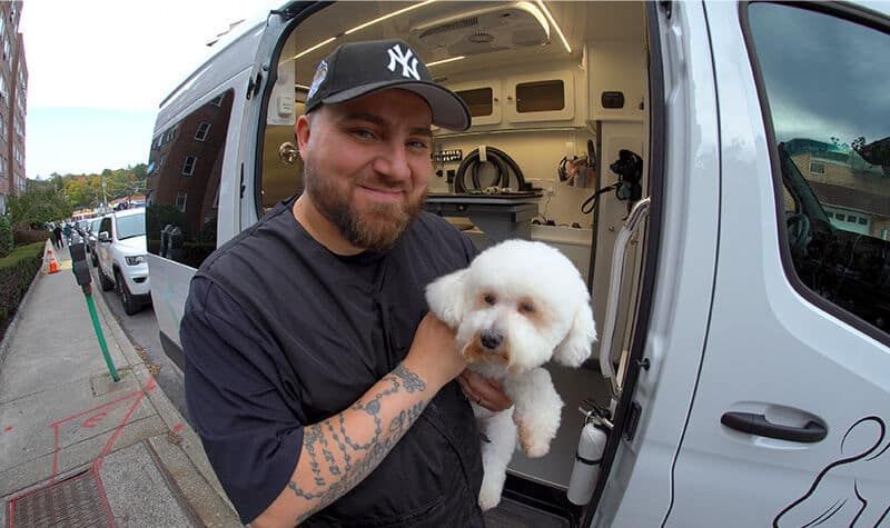 Charles with his Wag'n Tails mobile grooming van