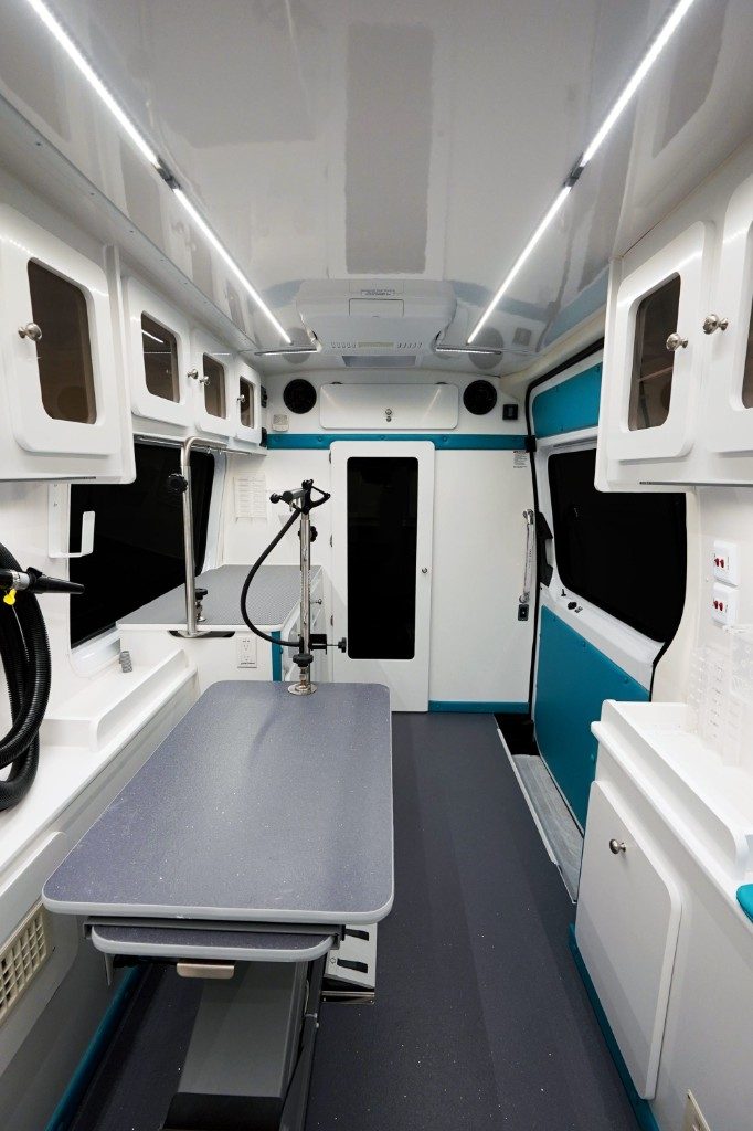 Supreme Groom interior aisle toward the rear with teal door panel