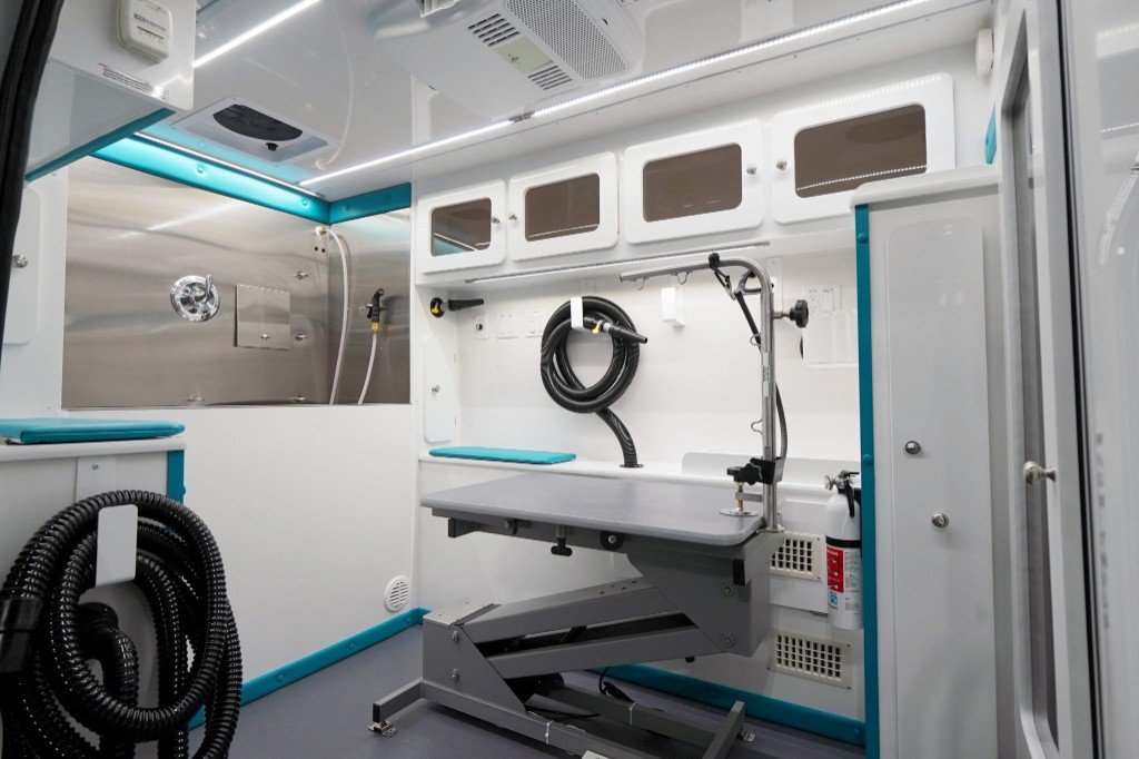 Ultra Groom salon interior workspace with teal accents and room to work solo