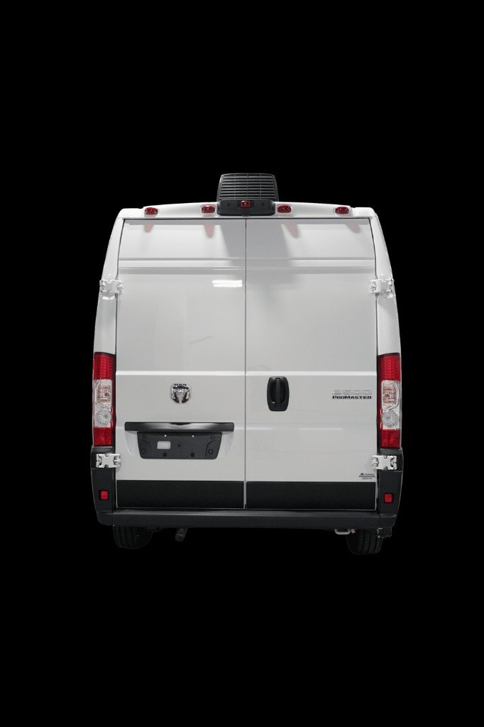 Ultra Groom Van rear exterior closed on a black studio backdrop, RAM ProMaster 2500