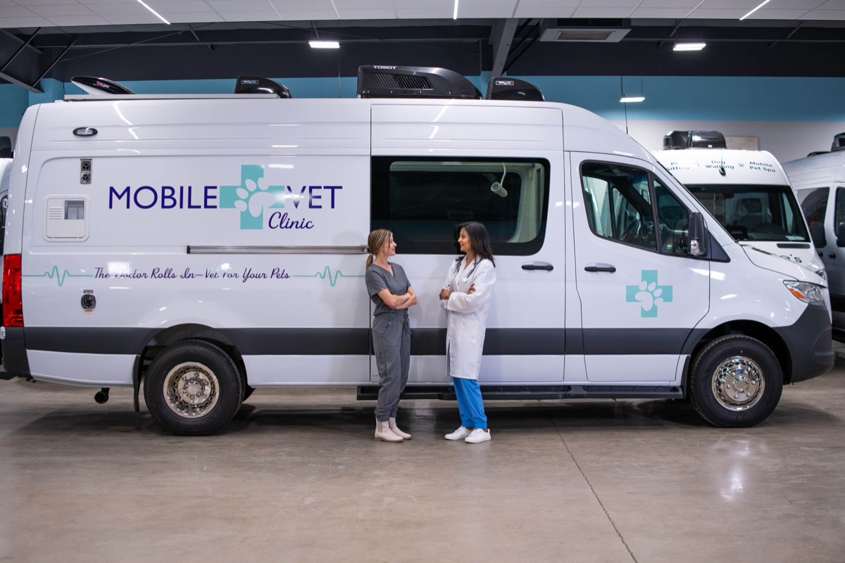 Veterinary professionals with a Wag'n Tails mobile clinic